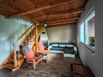 Dom na sprzedaż z garażem i dużą działką nad jeziorem – 55 m² powierzchni użytkowej, działka 532 m²