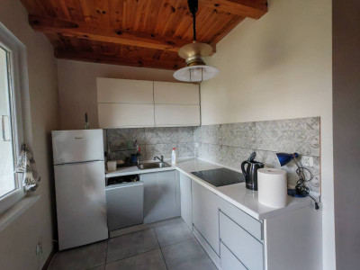 Dom na sprzedaż z garażem i dużą działką nad jeziorem – 55 m² powierzchni użytkowej, działka 532 m²